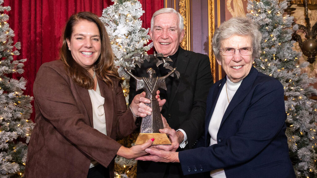 Catholic Charities USA President and CEO Kerry Alys Robinson accepts the Spirit of Saint Francis Award.