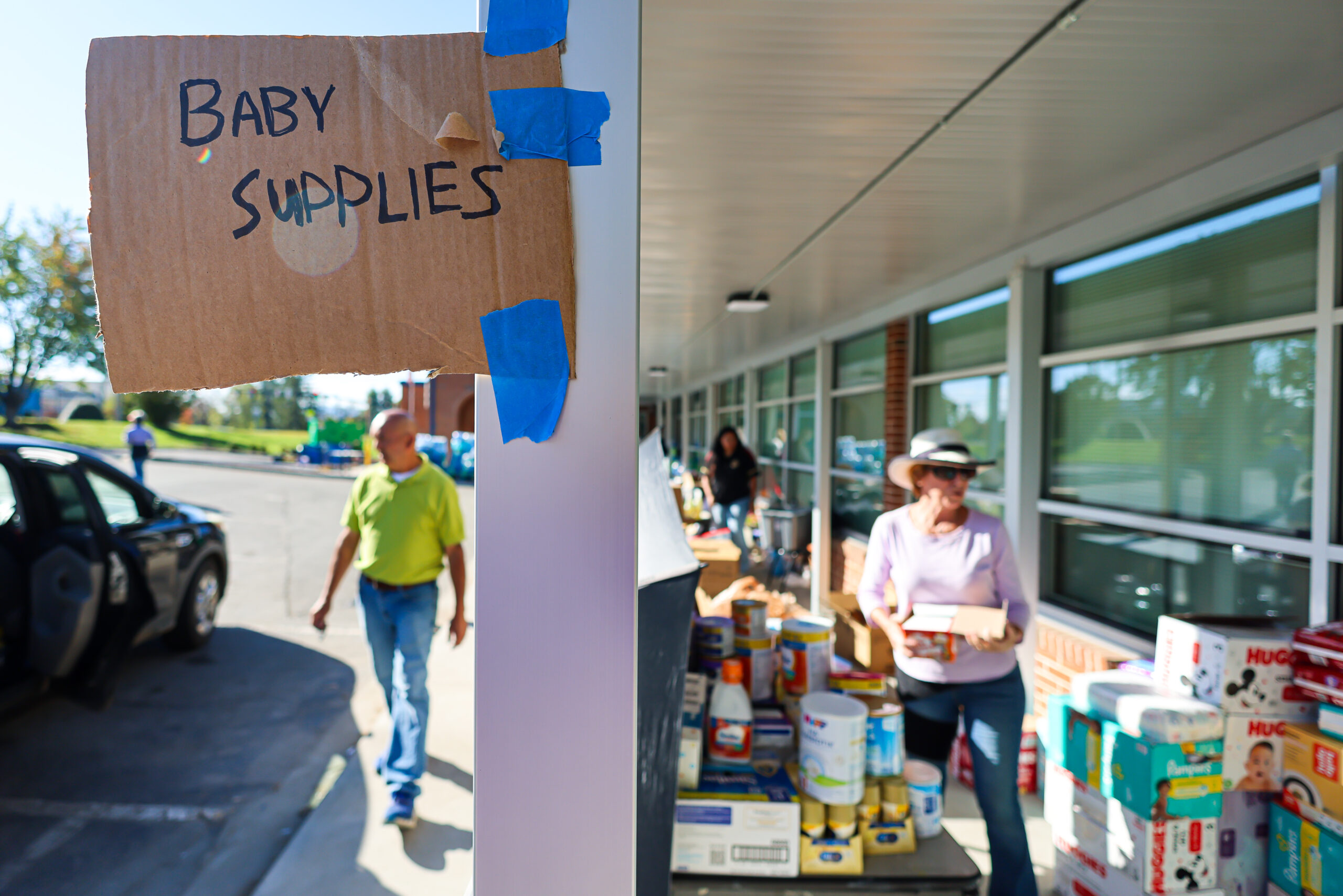 Volunteers with Catholic Charities Diocese of Charlotte stage and distribute supplies in the aftermath of Hurricane Helene in Asheville, NC.